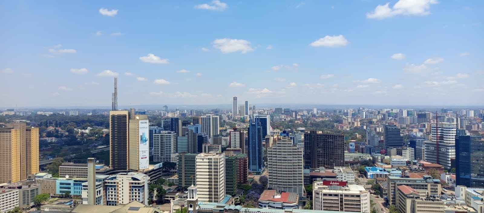 A dense view of CBD skyscrapers, highlighting the variety of architectural styles and the constant growth of the city.