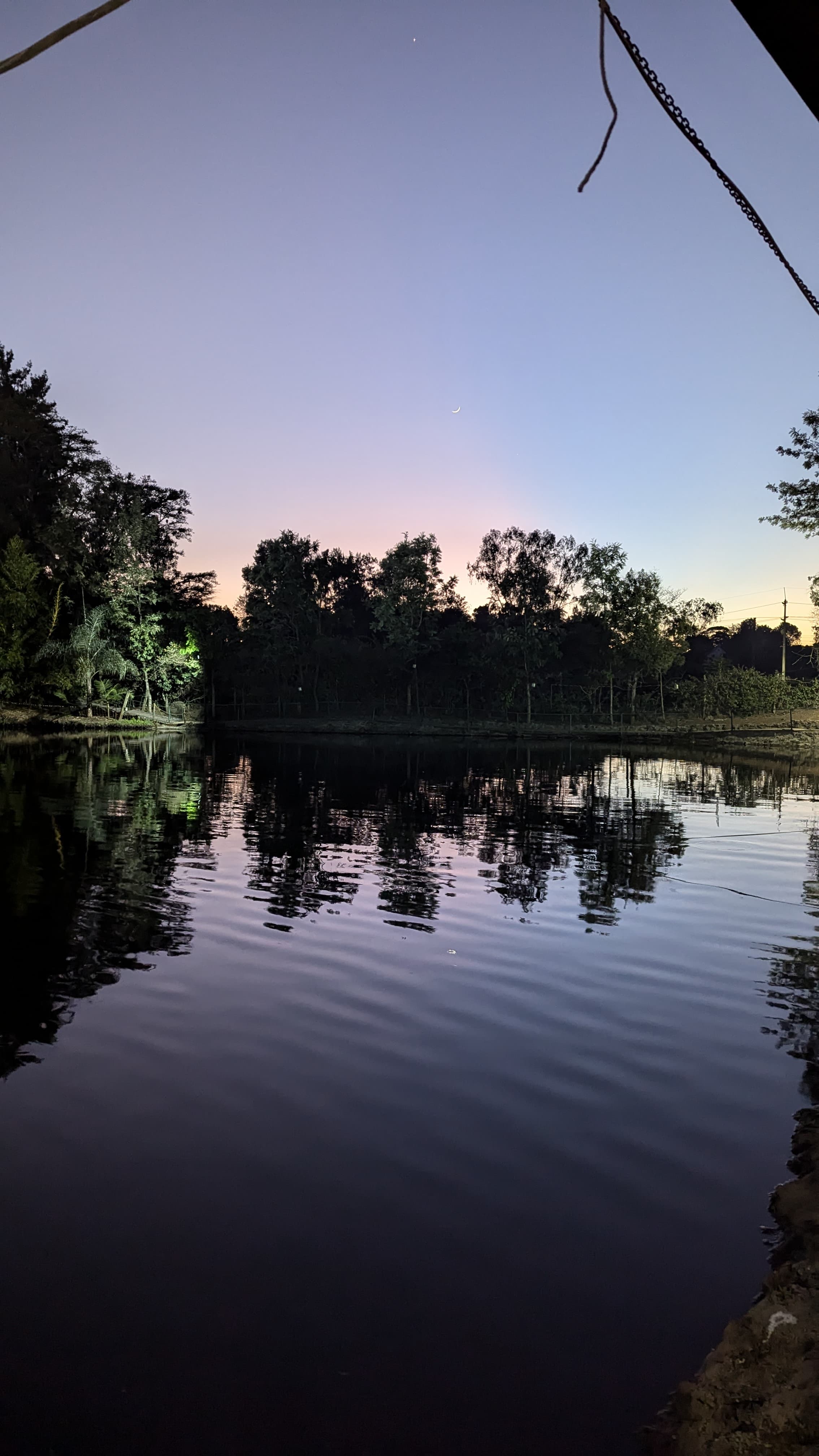 A few minutes after the golden hour, the sky is a gradient of orange and purple.